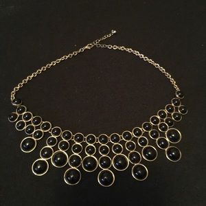 Gold and black necklace